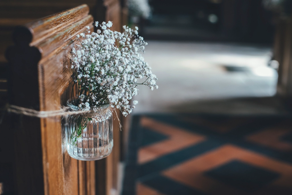 White baby's-breath flowers glass jar