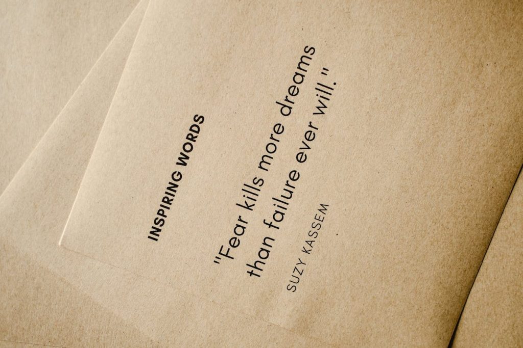 close up shot of inspiring words on a brown paper