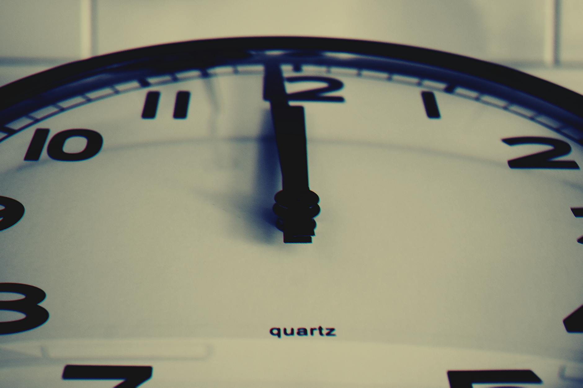 white and black wall clockj