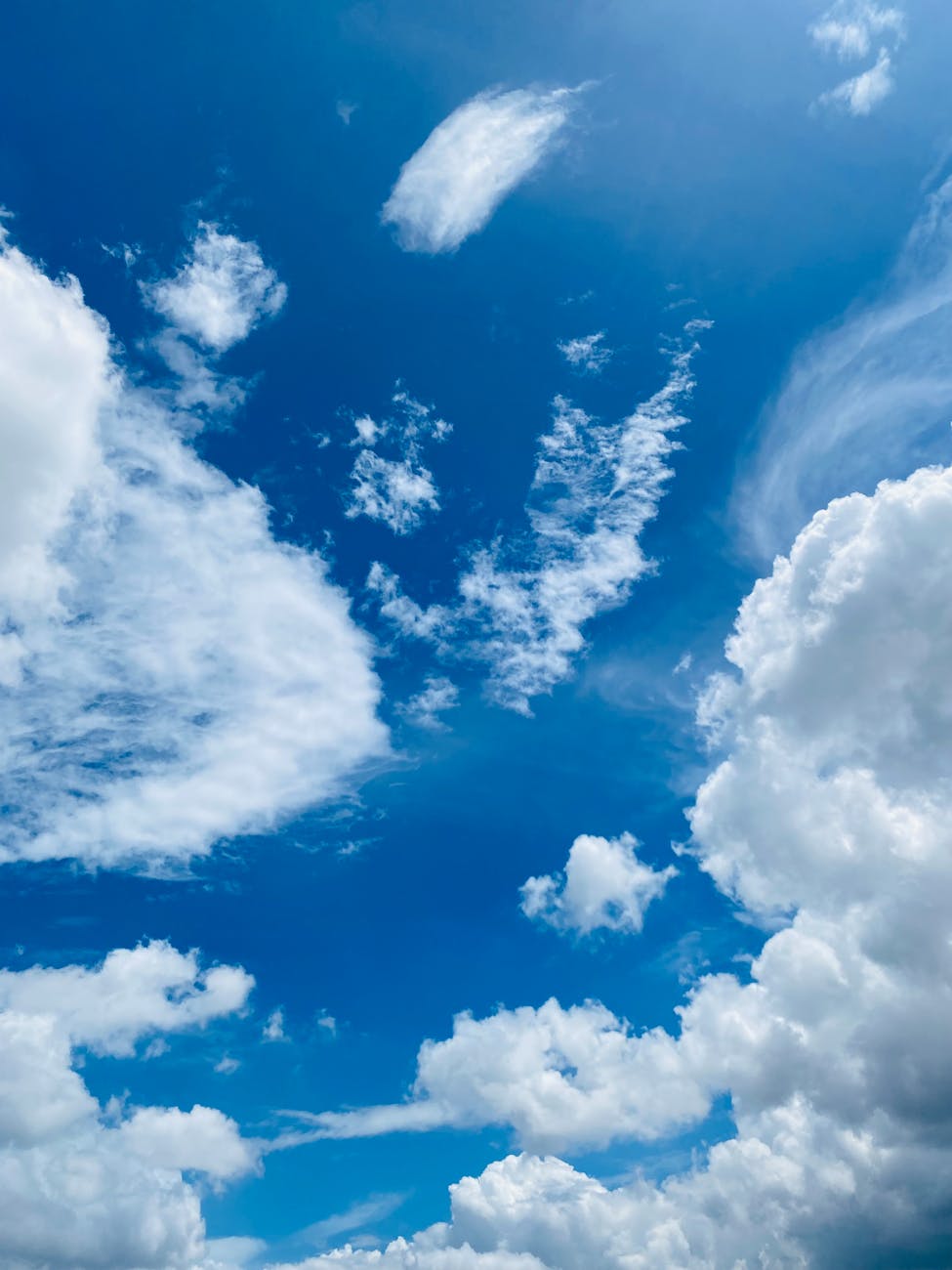 bright blue sky with fluffy white clouds