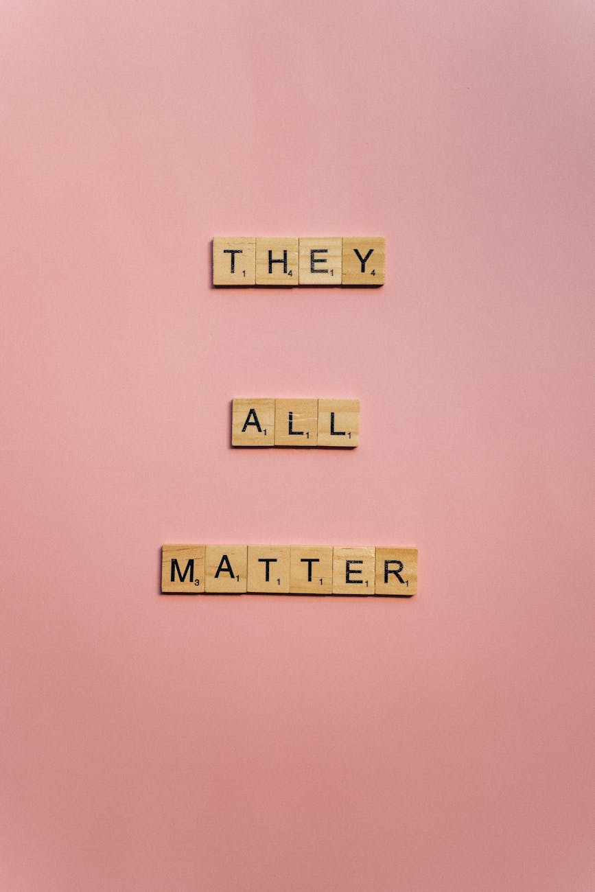 they all matter slogan on wooden scrabble pieces